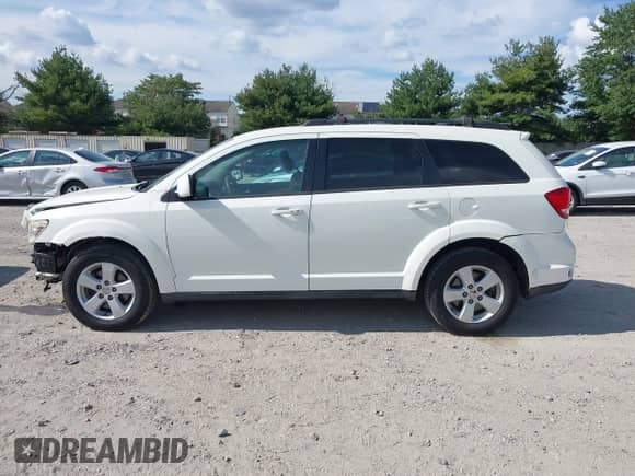 2012 Dodge Journey SXT с VIN 3C4PDCBG5CT393466, выставлен на аукционе IAAI как лот 43175067 с пробегом 164 793 миль миль и . История ставок и продаж доступна на DreamBid. Изображение 14.