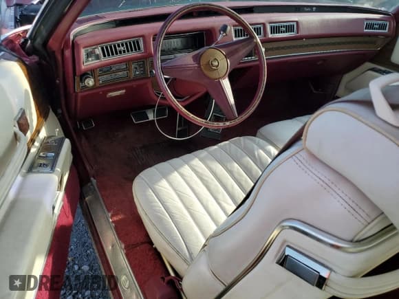 ✅ 1974 Cadillac Eldorado • VIN: 6L47S4Q428658 • Lot: 64831645. Listed on Copart with 31,180 mi. Free auction sales archive from the USA and detailed vehicle history report at DreamBid. Image 8.