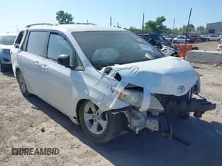 ✅ 2015 Toyota Sienna LE AAS • VIN: 5TDKK3DC3FS672570 • Lot: 42824951. Listed on IAAI with 112,476 mi. Free auction sales archive from the USA and detailed vehicle history report at DreamBid. Image 1.