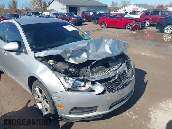 2013 Chevrolet Cruze 2LT with VIN 1G1PE5SB2D7245528, listed as a IAAI auction lot 43503941 with 173,810 mi miles and . Bid and sale history available at DreamBid. Image 6.