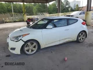 ✅ 2013 Hyundai Veloster w/Gray Int • VIN: KMHTC6AD0DU148961 • Lot: 69936434. Wystawiony na Copart z przebiegiem 135 371 mil. Bezpłatny archiwum sprzedaży aukcyjnych z USA i szczegółowy raport historii pojazdu na DreamBid. Zdjęcie 1.
