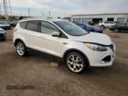 ✅ 2014 Ford Escape Titanium • VIN: 1FMCU0J94EUB57511 • Lot: 91354325. Wystawiony na Copart z przebiegiem 121 049 mil. Bezpłatny archiwum sprzedaży aukcyjnych z USA i szczegółowy raport historii pojazdu na DreamBid. Zdjęcie 4.