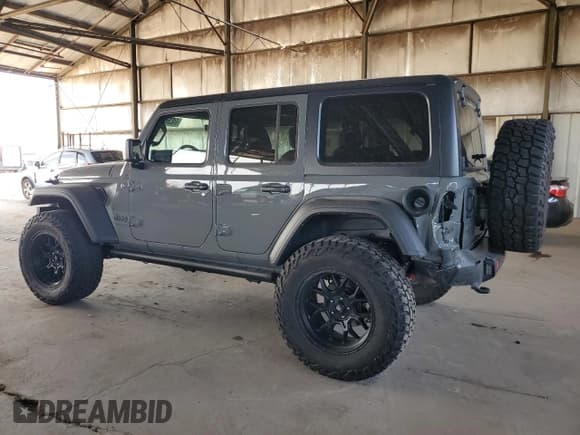 ✅ 2022 Jeep Wrangler Unlimited High Tide • VIN: 1C4HJXDG2NW221829 • Lot: 64836074. Listed on Copart with 3,394 mi. Free auction sales archive from the USA and detailed vehicle history report at DreamBid. Image 2.