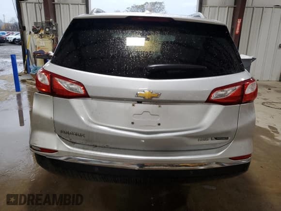 ✅ 2018 Chevrolet Equinox Premier • VIN: 2GNAXVEV0J6124819 • Лот: 91703805. Опубликован ранее на Copart с пробегом 102 223 миль. Бесплатный доступ к архиву аукционных продаж из США и подробный отчёт об истории автомобиля на DreamBid. Изображение 6.