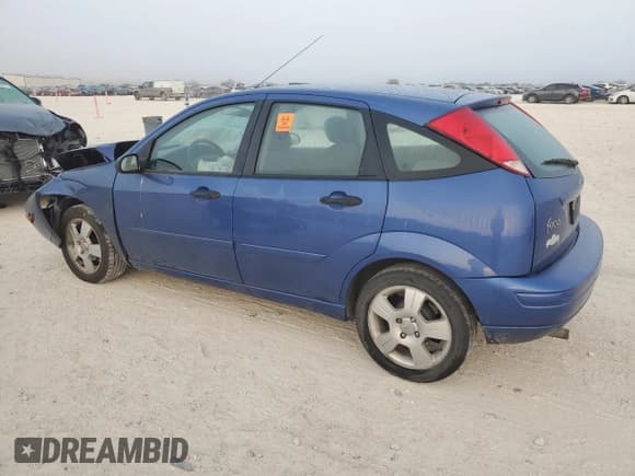 ✅ 2004 Ford Focus ZX5 • VIN: 3FAHP373X4R119847 • Лот: 77478124. Опубликован ранее на Copart с пробегом Не указан. Бесплатный доступ к архиву аукционных продаж из США и подробный отчёт об истории автомобиля на DreamBid. Изображение 2.