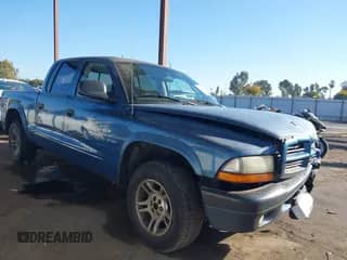 2002 Dodge Dakota Sport with VIN 1B7HL38N22S652119, listed as a IAAI auction lot 43395458 with 162,733 mi miles and . Bid and sale history available at DreamBid. Image 1.
