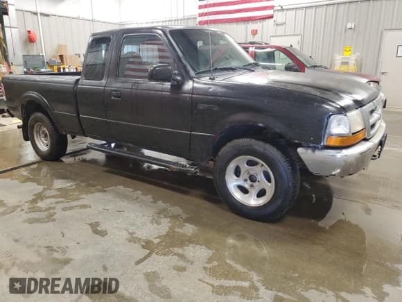 ✅ 2000 Ford Ranger XLT • VIN: 1FTZR15X4YTB28390 • Lot: 64061415. Listed on Copart with 165,592 mi. Free auction sales archive from the USA and detailed vehicle history report at DreamBid. Image 4.