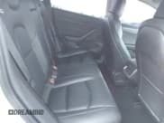 ✅ 2021 Tesla Model 3 Long Range • VIN: 5YJ3E1EB4MF010097 • Lot: 41546083. Wystawiony na IAAI z przebiegiem 128 710 mil. Bezpłatny archiwum sprzedaży aukcyjnych z USA i szczegółowy raport historii pojazdu na DreamBid. Zdjęcie 8.