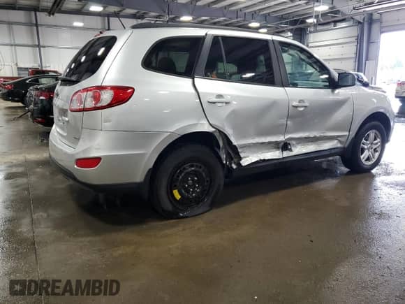 2012 Hyundai Santa Fe GLS with VIN 5XYZGDAB8CG119715, listed as a Copart auction lot 61458234 with 140,378 mi miles and Salvage title. Bid and sale history available at DreamBid. Image 3.