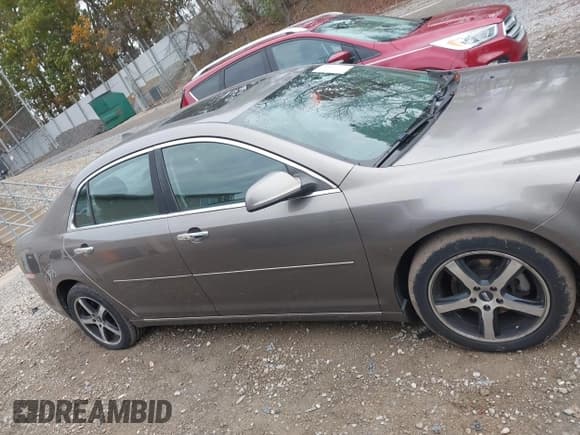 ✅ 2012 Chevrolet Malibu 2LT • VIN: 1G1ZD5E07CF111477 • Lot: 43474891. Listed on IAAI with 87,350 mi. Free auction sales archive from the USA and detailed vehicle history report at DreamBid. Image 13.