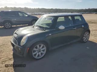 ✅ 2006 MINI Hardtop S • VIN: WMWRE33536TJ36483 • Lot: 84926995. Listed on Copart with 153,921 mi. Free auction sales archive from the USA and detailed vehicle history report at DreamBid. Image 1.