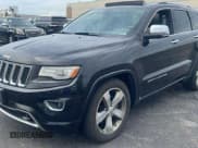 ✅ 2014 Jeep Grand Cherokee Overland • VIN: 1C4RJFCG7EC181541 • Lot: 90742475. Listed on Copart with 226,758 mi. Free auction sales archive from the USA and detailed vehicle history report at DreamBid. Image 2.