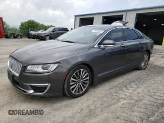 ✅ 2018 Lincoln MKZ Hybrid Select • VIN: 3LN6L5LU1JR626893 • Lot: 56979035. Wystawiony na Copart z przebiegiem 105 289 mil. Bezpłatny archiwum sprzedaży aukcyjnych z USA i szczegółowy raport historii pojazdu na DreamBid. Zdjęcie 1.