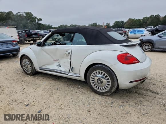 ✅ 2014 Volkswagen Beetle 2.0L TDI • VIN: 3VW5L7AT7EM818728 • Lot: 95842295. Listed on Copart with 151,324 mi. Free auction sales archive from the USA and detailed vehicle history report at DreamBid. Image 2.