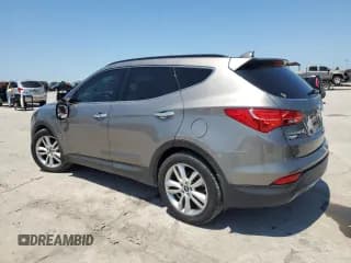 ✅ 2015 Hyundai Santa Fe • VIN: 5XYZW4LA6FG263629 • Лот: 57553744. Опубликован ранее на Copart с пробегом 75 409 миль. Бесплатный доступ к архиву аукционных продаж из США и подробный отчёт об истории автомобиля на DreamBid. Изображение 2.