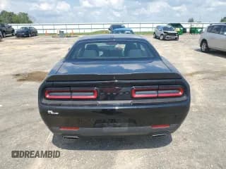 ✅ 2022 Dodge Challenger GT • VIN: 2C3CDZJG0NH140204 • Lot: 67255654. Wystawiony na Copart z przebiegiem 39 136 mil. Bezpłatny archiwum sprzedaży aukcyjnych z USA i szczegółowy raport historii pojazdu na DreamBid. Zdjęcie 6.