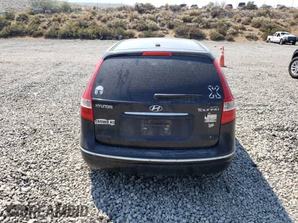 2009 Hyundai Elantra Touring z VIN KMHDC86E49U036995, wystawiony jako Copart lot #66968994 z przebiegiem Nie podano mil oraz Szkoda całkowita • Salvage title. Historia ofert i sprzedaży dostępna na DreamBid. Obrazek 6.