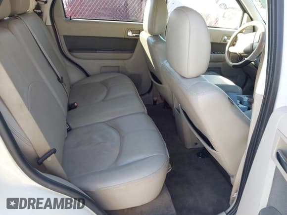 ✅ 2010 Mercury Mariner Premier • VIN: 4M2CN8HG0AKJ02994 • Lot: 43713687. Wystawiony na IAAI z przebiegiem 244 718 mil. Bezpłatny archiwum sprzedaży aukcyjnych z USA i szczegółowy raport historii pojazdu na DreamBid. Zdjęcie 8.