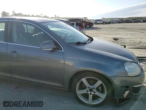 ✅ 2009 Volkswagen Jetta SE • VIN: 3VWRM71K99M149776 • Lot: 57708825. Listed on Copart with 147,655 mi. Free auction sales archive from the USA and detailed vehicle history report at DreamBid. Image 13.