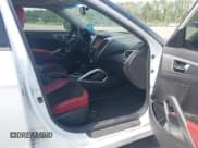 ✅ 2012 Hyundai Veloster w/Gray Int • VIN: KMHTC6ADXCU050034 • Lot: 42506584. Wystawiony na IAAI z przebiegiem 142 514 mil. Bezpłatny archiwum sprzedaży aukcyjnych z USA i szczegółowy raport historii pojazdu na DreamBid. Zdjęcie 5.