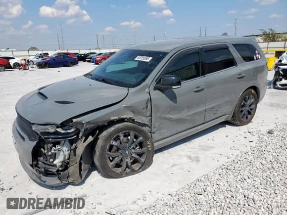 2019 Dodge Durango R/T with VIN 1C4SDHCT7KC604485, listed as a Copart auction lot 80928855 with 127,159 mi miles and Salvage title. Bid and sale history available at DreamBid. Image 1.