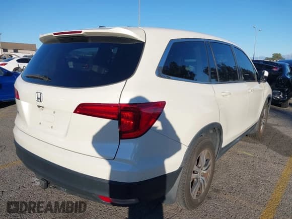 ✅ 2017 Honda Pilot EX-L • VIN: 5FNYF5H50HB018638 • Lot: 43851101. Listed on IAAI with 132,734 mi. Free auction sales archive from the USA and detailed vehicle history report at DreamBid. Image 4.