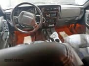 ✅ 1999 Jeep Cherokee Limited • VIN: 1J4FF78S1XL591580 • Lot: 92581565. Listed on Copart with 173,128 mi. Free auction sales archive from the USA and detailed vehicle history report at DreamBid. Image 8.