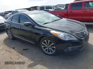 2015 Hyundai Azera Limited z VIN KMHFH4JG8FA435093, wystawiony jako IAAI lot #41601706 z przebiegiem 142 820 mil mil oraz . Historia ofert i sprzedaży dostępna na DreamBid. Obrazek 1.