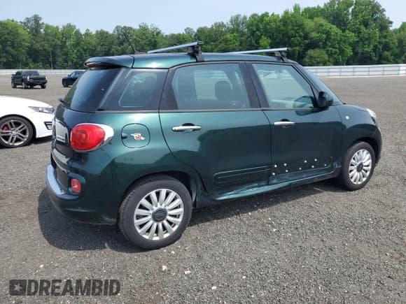 ✅ 2014 FIAT 500L Easy • VIN: ZFBCFABHXEZ001537 • Lot: 60761695. Listed on Copart with 85,942 mi. Free auction sales archive from the USA and detailed vehicle history report at DreamBid. Image 3.