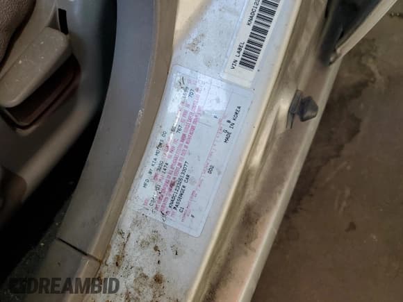 ✅ 2002 Kia Rio • VIN: KNADC123326133077 • Lot: 52427975. Listed on Copart with 105,357 mi. Free auction sales archive from the USA and detailed vehicle history report at DreamBid. Image 12.