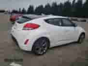 2017 Hyundai Veloster с VIN KMHTC6AD4HU312749, выставлен на аукционе Copart как лот 71572074 с пробегом 129 765 миль миль и Списание • Salvage title. История ставок и продаж доступна на DreamBid. Изображение 3.