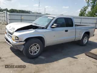2002 Dodge Dakota SLT с VIN 1B7GL42N32S692316, выставлен на аукционе Copart как лот 55309145 с пробегом 105 653 миль миль и Списание • Salvage title. История ставок и продаж доступна на DreamBid. Изображение 1.
