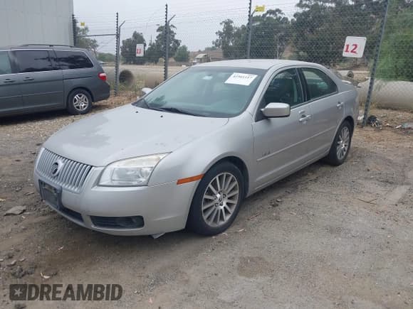 ✅ 2008 Mercury Milan • VIN: 3MEHM07ZX8R600305 • Lot: 42561117. Listed on IAAI with 120,094 mi. Free auction sales archive from the USA and detailed vehicle history report at DreamBid. Image 2.