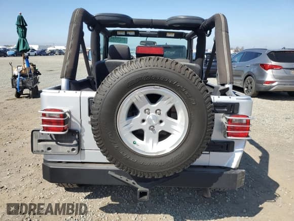 ✅ 2006 Jeep Wrangler Unlimited LWB • VIN: 1J4FA44S16P771071 • Лот: 81428585. Опубликован ранее на Copart с пробегом 55 726 миль. Бесплатный доступ к архиву аукционных продаж из США и подробный отчёт об истории автомобиля на DreamBid. Изображение 6.
