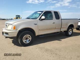 ✅ 1998 Ford F-150 • VIN: 1FTRX18L3WKA51500 • Lot: 65781735. Listed on Copart with 182,104 mi. Free auction sales archive from the USA and detailed vehicle history report at DreamBid. Image 1.