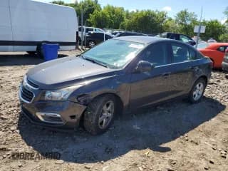 ✅ 2016 Chevrolet Cruze LT • VIN: 1G1PE5SB0G7133475 • Lot: 69510875. Listed on Copart with 105,653 mi. Free auction sales archive from the USA and detailed vehicle history report at DreamBid. Image 1.