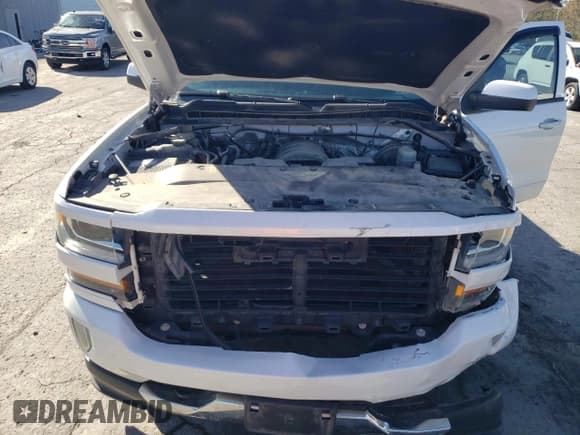 ✅ 2018 Chevrolet Silverado 1500 LT • VIN: 3GCUKREC7JG124119 • Lot: 89725465. Wystawiony na Copart z przebiegiem 111 091 mil. Bezpłatny archiwum sprzedaży aukcyjnych z USA i szczegółowy raport historii pojazdu na DreamBid. Zdjęcie 11.