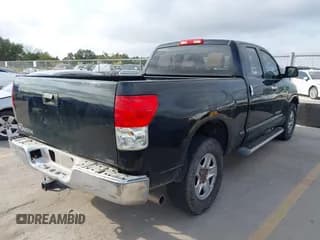 ✅ 2009 Toyota Tundra SR5 • VIN: 5TFRU54129X018063 • Lot: 43453357. Listed on IAAI with 243,342 mi. Free auction sales archive from the USA and detailed vehicle history report at DreamBid. Image 4.