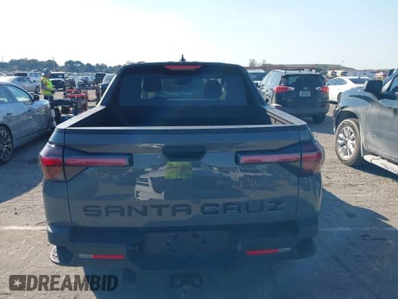 2022 Hyundai Santa Cruz SE with VIN 5NTJA4AE1NH008896, listed as a IAAI auction lot 41444400 with 23,547 mi miles and . Bid and sale history available at DreamBid. Image 16.