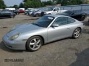 ✅ 2000 Porsche 911 • VIN: WP0AA2990YS620829 • Lot: 67077885. Wystawiony na Copart z przebiegiem 149 289 mil. Bezpłatny archiwum sprzedaży aukcyjnych z USA i szczegółowy raport historii pojazdu na DreamBid. Zdjęcie 1.