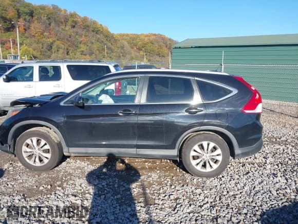 ✅ 2014 Honda CR-V EX-L • VIN: 2HKRM4H76EH658095 • Lot: 43534150. Listed on IAAI with 162,647 mi. Free auction sales archive from the USA and detailed vehicle history report at DreamBid. Image 15.