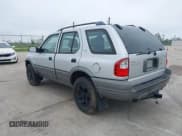 ✅ 2000 Isuzu Rodeo S • VIN: 4S2CK58W3Y4308219 • Lot: 41939765. Listed on IAAI with 241,486 mi. Free auction sales archive from the USA and detailed vehicle history report at DreamBid. Image 3.