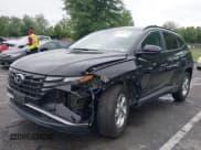 ✅ 2022 Hyundai Tucson SEL • VIN: KM8JBCAE6NU031615 • Lot: 42887395. Listed on IAAI with 63,078 mi. Free auction sales archive from the USA and detailed vehicle history report at DreamBid. Image 6.