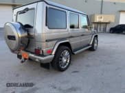 ✅ 2003 Mercedes-Benz G 500 • VIN: WDCYR49E33X140998 • Лот: 88914945. Опубликован ранее на Copart с пробегом 84 737 миль. Бесплатный доступ к архиву аукционных продаж из США и подробный отчёт об истории автомобиля на DreamBid. Изображение 4.