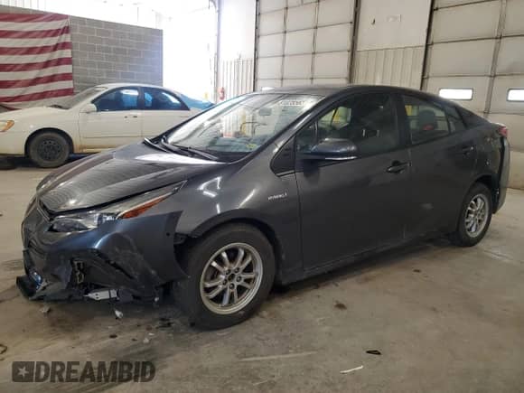 2021 Toyota Prius L Eco с VIN JTDKAMFU5M3143781, выставлен на аукционе Copart как лот 81028565 с пробегом 52 355 миль миль и Списание • Salvage title. История ставок и продаж доступна на DreamBid. Изображение 1.