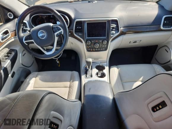 ✅ 2018 Jeep Grand Cherokee Summit • VIN: 1C4RJFJG4JC506708 • Lot: 82303345. Listed on Copart with 104,788 mi. Free auction sales archive from the USA and detailed vehicle history report at DreamBid. Image 8.