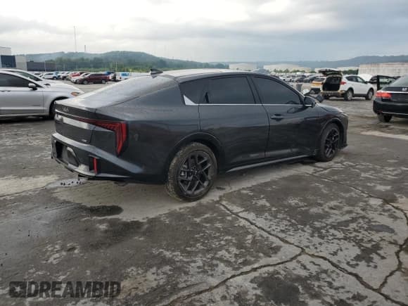 ✅ 2025 Kia K4 GT-Line Turbo • VIN: 3KPFW4DC8SE101320 • Lot: 71191955. Listed on Copart with 9,399 mi. Free auction sales archive from the USA and detailed vehicle history report at DreamBid. Image 3.