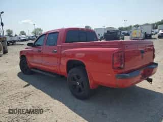 2007 Dodge Dakota SLT z VIN 1D7HW48KX7S137451, wystawiony jako Copart lot #65422694 z przebiegiem 111 820 mil mil oraz Czysty tytuł • Clean title. Historia ofert i sprzedaży dostępna na DreamBid. Obrazek 2.