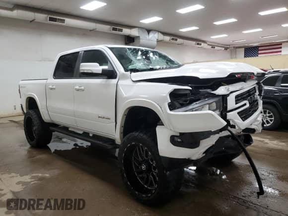 2020 Ram 1500 Laramie с VIN 1C6SRFJT9LN196027, выставлен на аукционе Copart как лот 64685205 с пробегом 52 724 миль миль и На запчасти • Non repairable. История ставок и продаж доступна на DreamBid. Изображение 4.