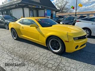 ✅ 2013 Chevrolet Camaro LS • VIN: 2G1FA1E3XD9162271 • Lot: 94939435. Listed on Copart with 116,299 mi. Free auction sales archive from the USA and detailed vehicle history report at DreamBid. Image 1.